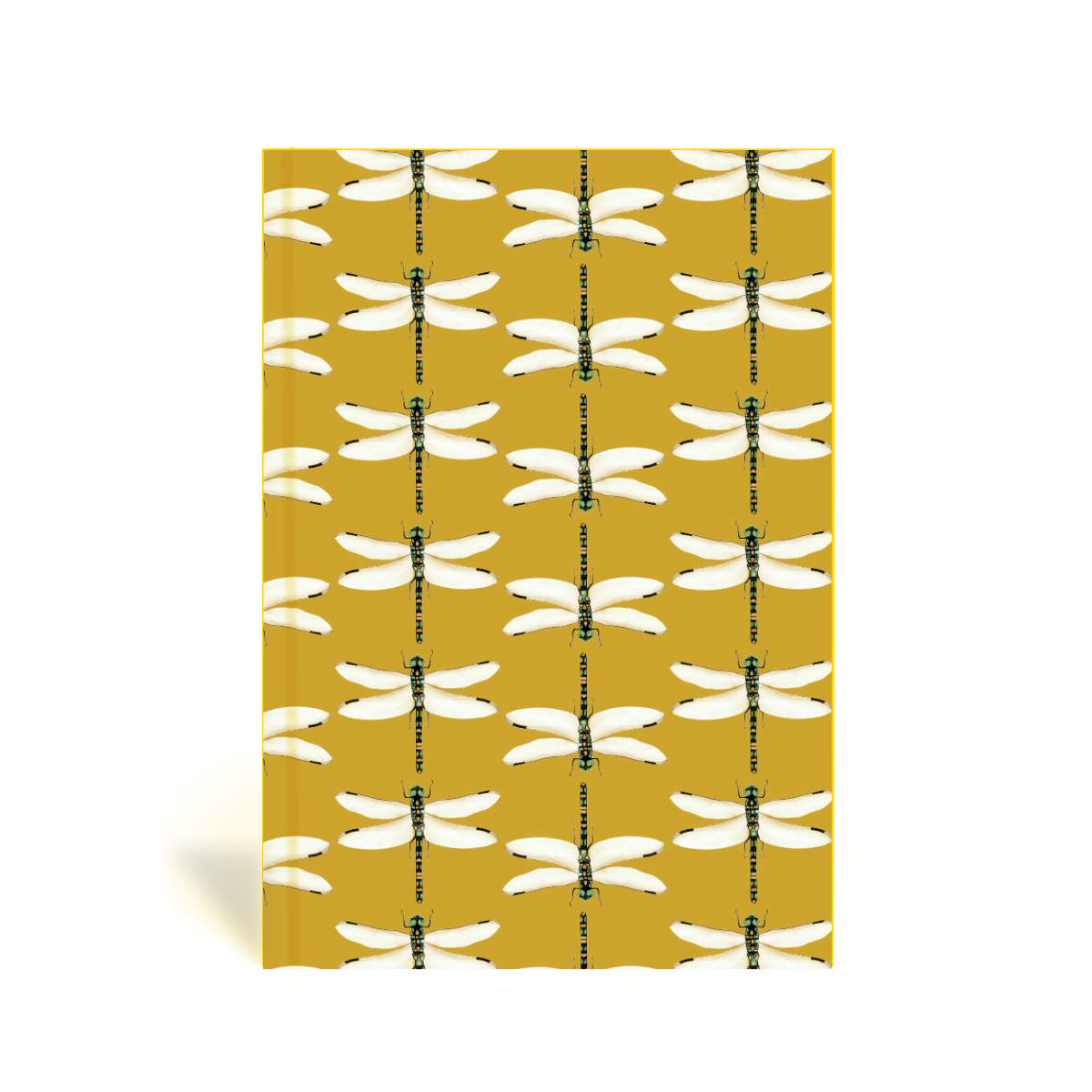 Book with dragonfly pattern on a chartreuse background